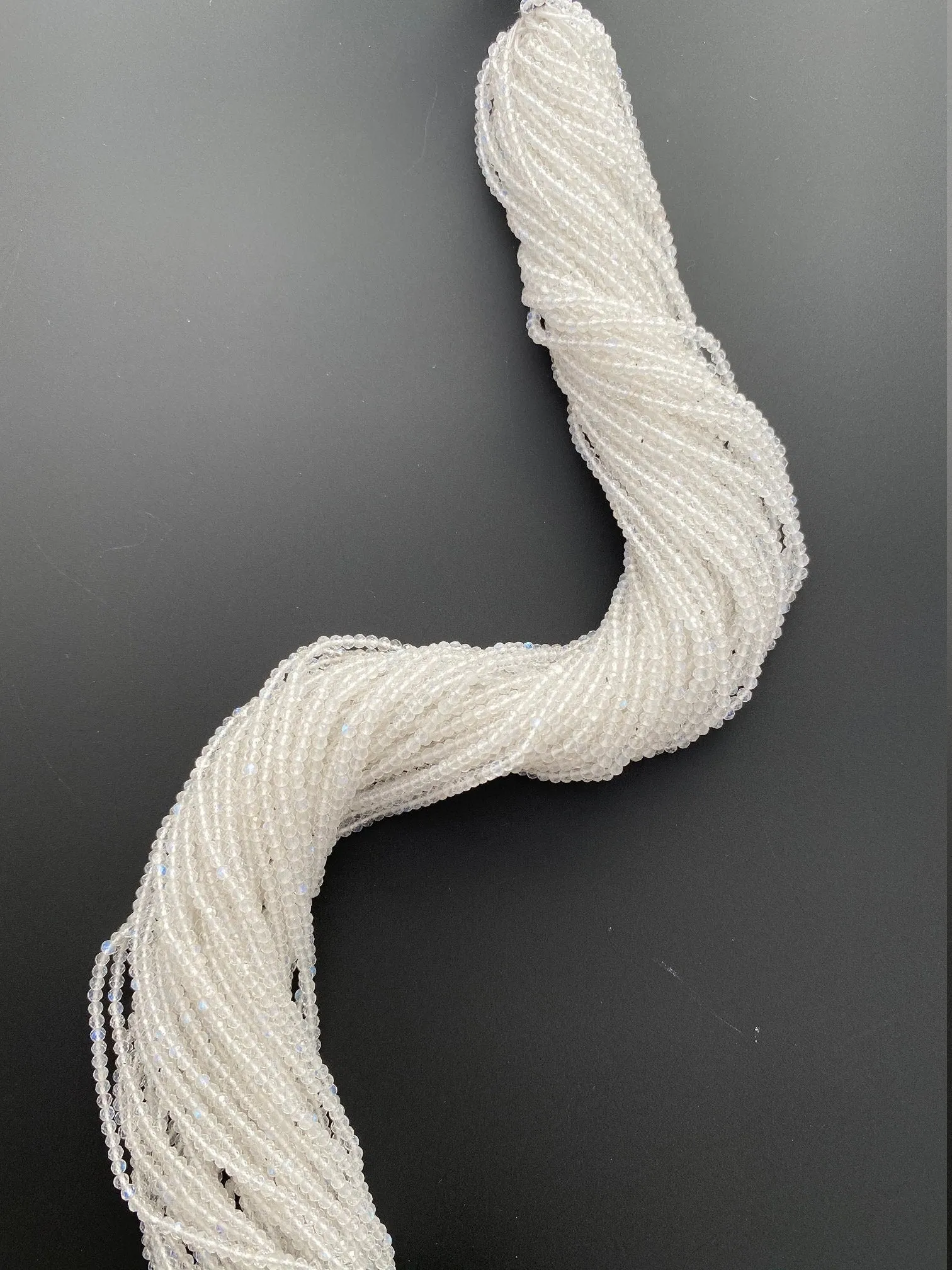 1 Strand of Natural White Rainbow Moonstone Faceted Rondelle Beads. 100% Natural. Each bead is clean and has fire, 3mm size, #moon3