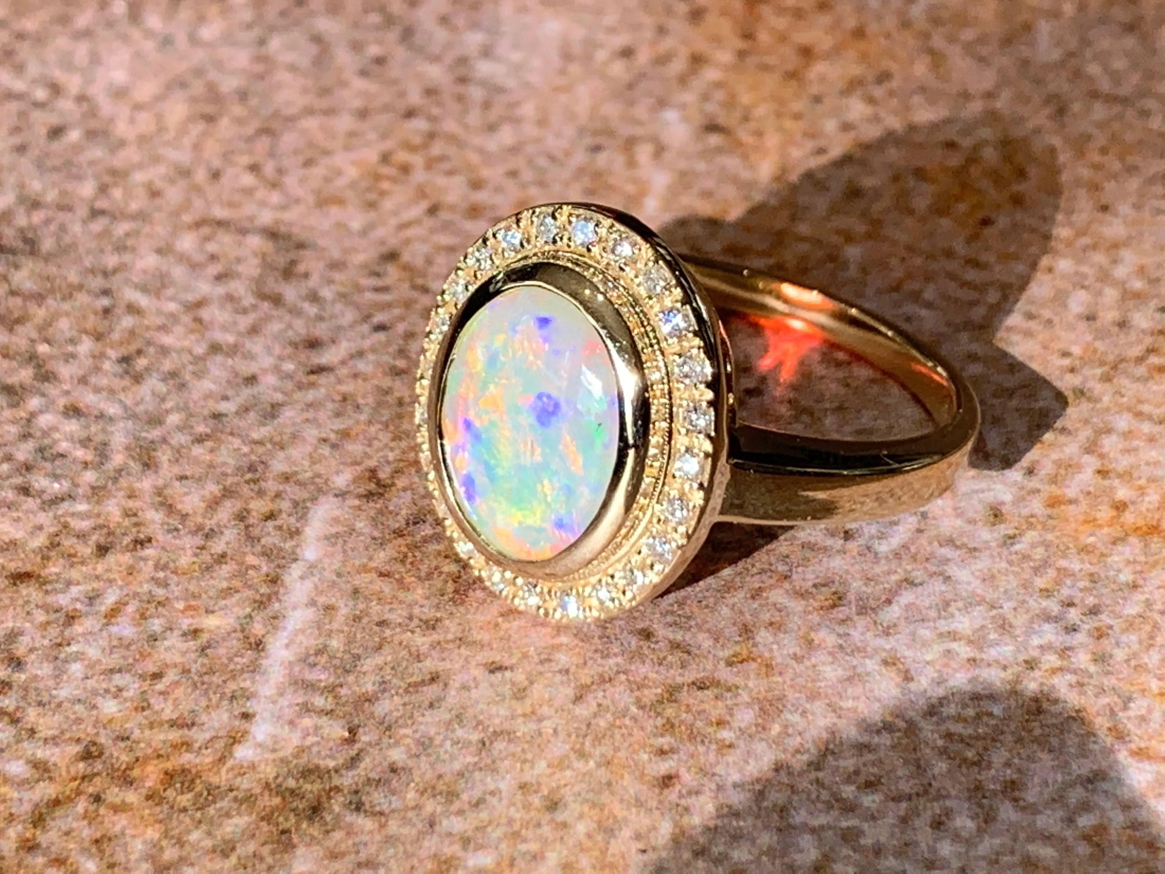 14kt Yellow Gold White Fire Opal and diamond ring