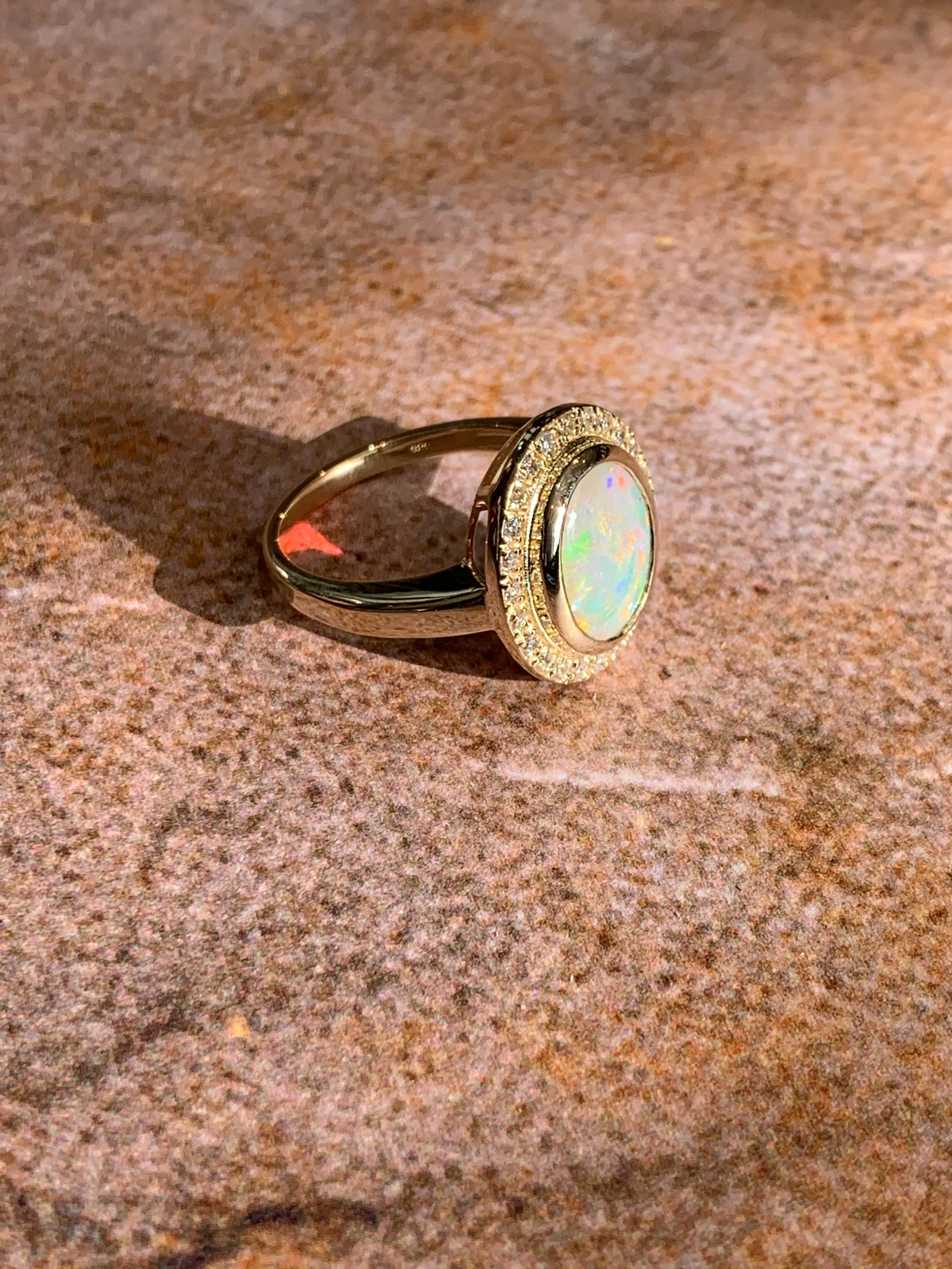 14kt Yellow Gold White Fire Opal and diamond ring