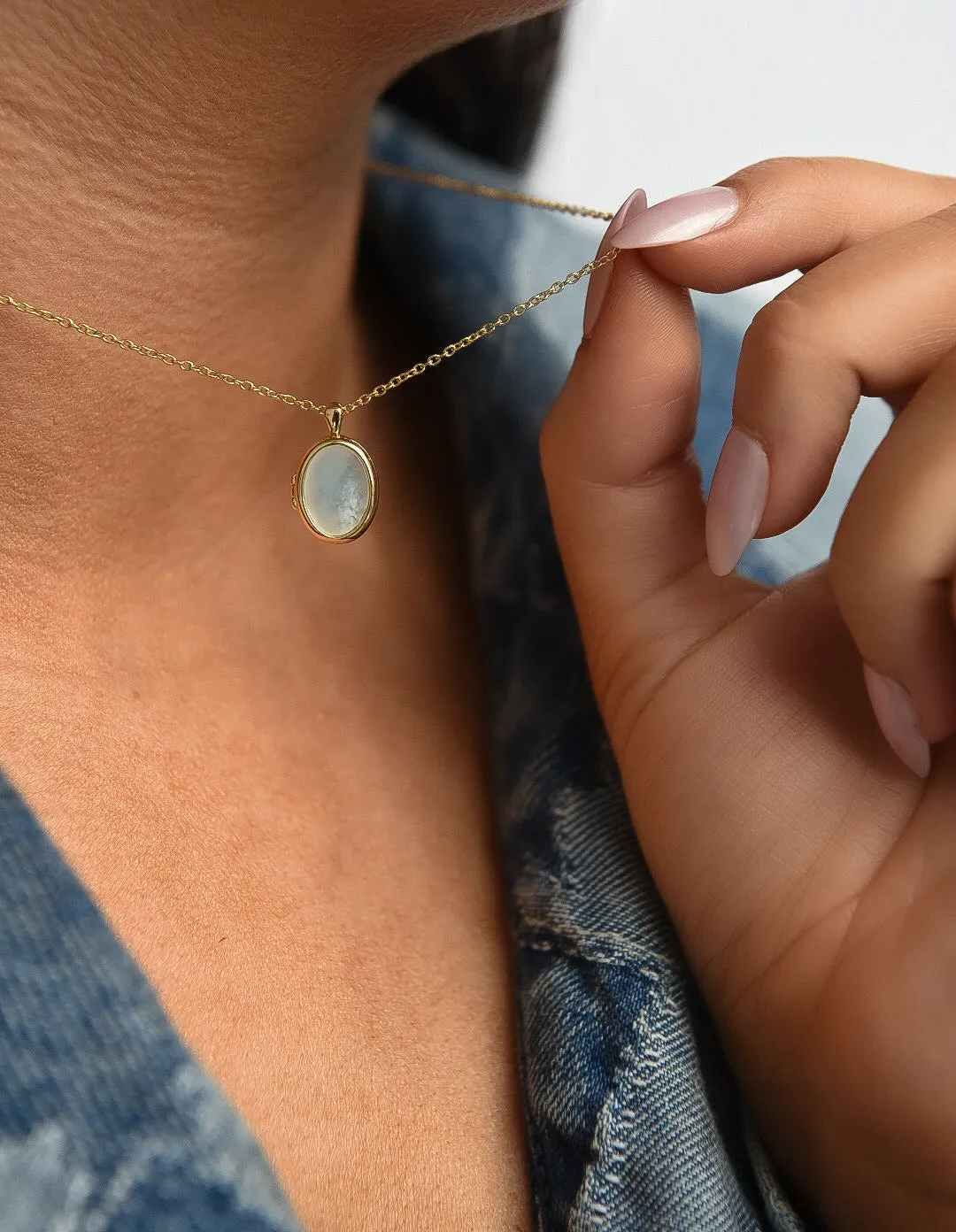 Golden Mother Of Pearl & Black Onyx Locket