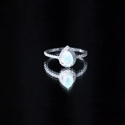 Pear Shaped Ethiopian Opal Halo Engagement Ring with Diamond